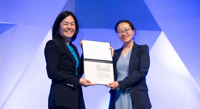 Yangying Zhu (right), assistant professor in the UCSB Mechanical Engineering Department, receives her award certificate from ARPA-E Program